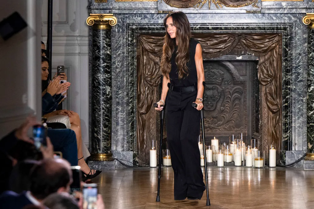 Why is Victoria Beckham using crutches to walk