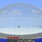 Minecraft player constructing a curved dome roof using stone blocks and architectural techniques