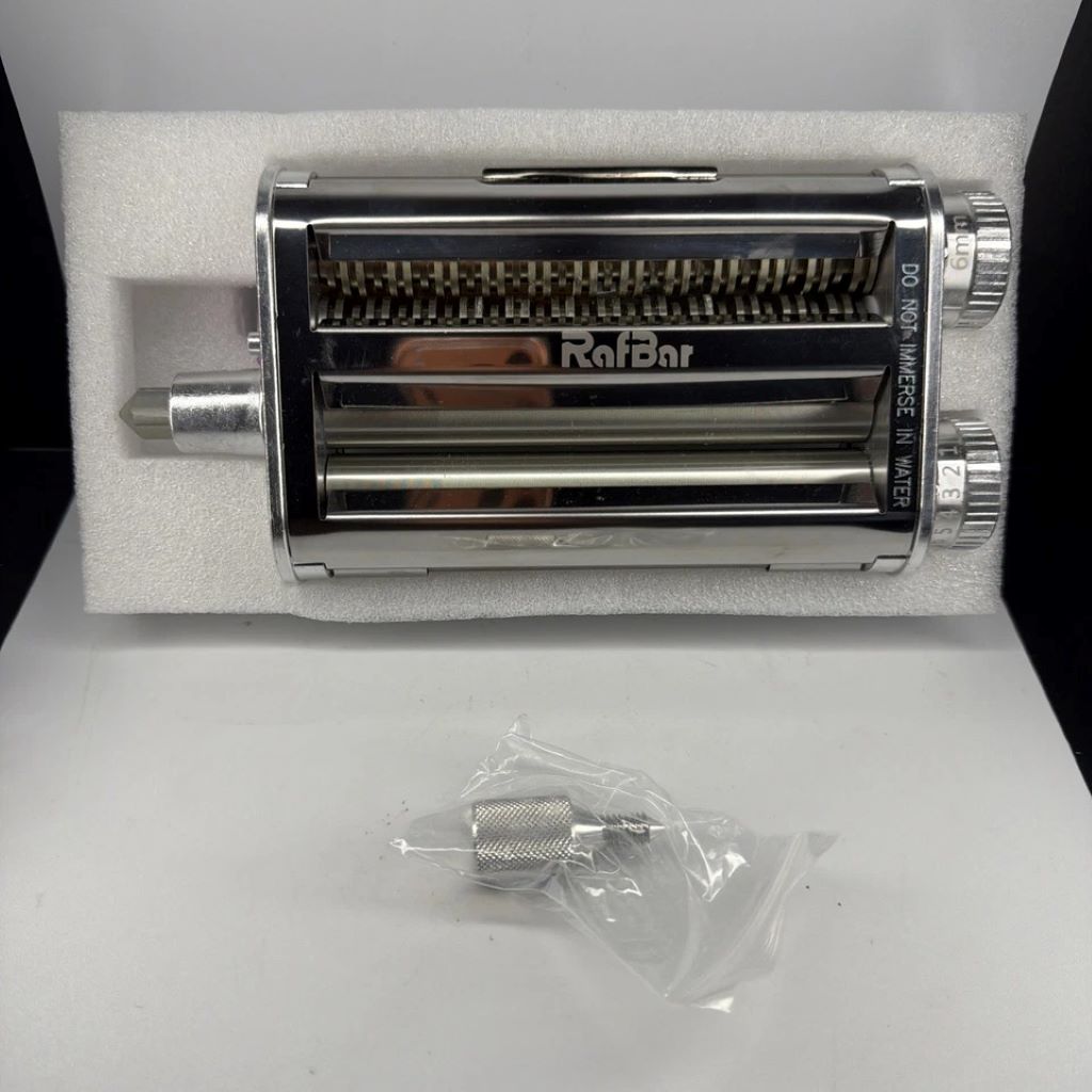 RAFBAR 3-in-1 pasta maker attachment on a KitchenAid mixer with fresh pasta.