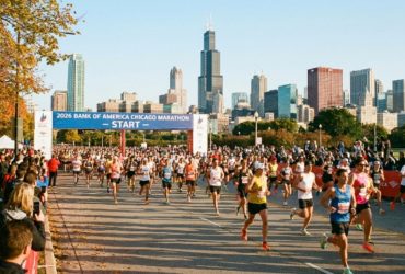 Thousands of runners crossing the start line in Grant Park at the 2026 Bank of America Chicago Marathon on a crisp October morning in Chicago