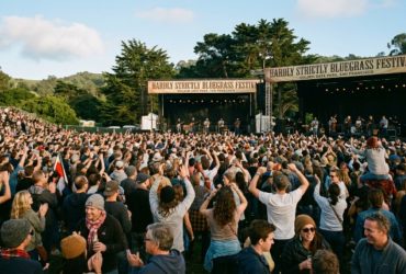 Crowd enjoying live music at Hardly Strictly Bluegrass festival in Golden Gate Park San Francisco