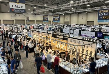 Rows of gemstone and jewelry vendors inside Hall B at the Pasadena Convention Center during the International Gem and Jewelry Show