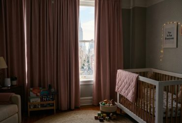 Pastel pink blackout curtains blocking bright NYC sunlight in a child’s room.